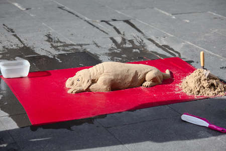 sand dog sculpture in Romeの写真素材