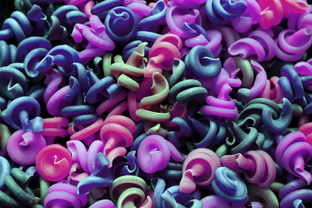 Multicolored pasta. Colored pasta.