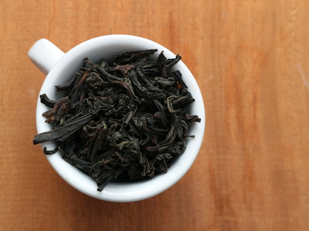 A cup of dry tea. Black tea. A cup of tea.の写真素材