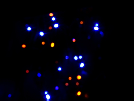 Christmas garland. Bokeh. Blurred colored lights. Garland. Beautiful blurred color background