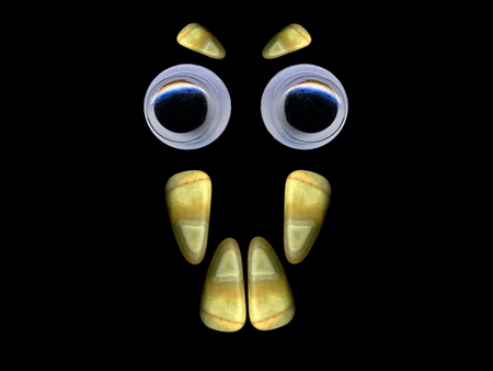 Figures laid out by children from multi-colored pebbles. Figure from multi-colored stones. Stone figures. Pebbles.の写真素材