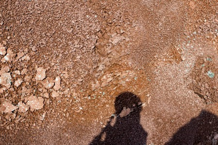 Red earth or soil background. Tropical laterite soil  background of red clay. Dry Orange surface, Picture of natural disaster. Drought land Caused by global warming and deforestation.の写真素材