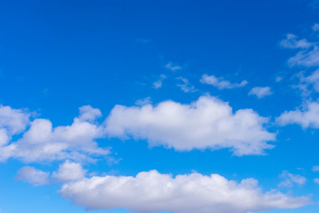 Sunshine clouds sky during morning background.  Blue,white pastel heaven,soft focus lens flare sunlightの写真素材