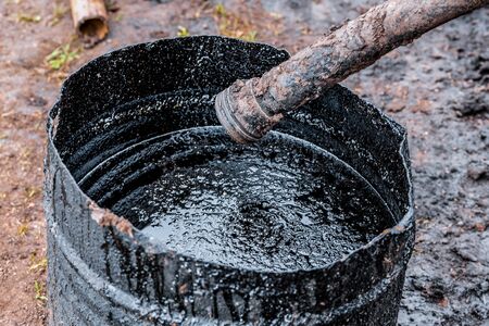 crude oil surface background textured. Pollution with oil products.