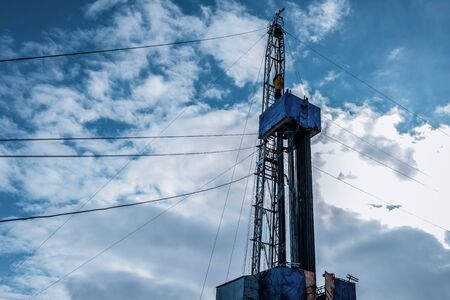Drilling rig in oil field for drilled into subsurface in order to produced crude. Petroleum Industry