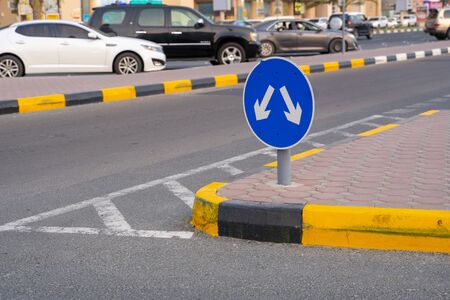 Sign of detour obstacles on the left or on the right with cracked white color paint texture. Detour obstacles on the left or on the rightの写真素材