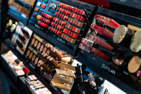 United Arab Emirates, UAE 3.MARCH.2020: Cosmetics shop with great variety of products. Concept of consumerism, retail and purchase. Showcase with a variety of cosmetics in the store.のeditorial素材