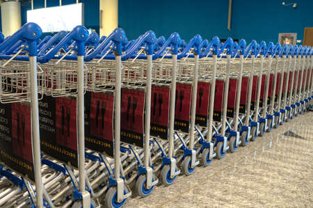 Ufa, Russia april 2, 2020: Trolley for luggage or baggage transportation at airports.