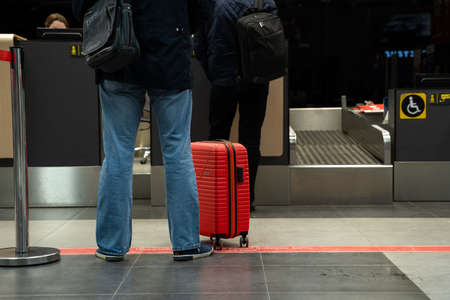 Ufa, Russia april 2, 2020: Passengers arrive at check-in counters at UFA Airport in Russia. Crowds...