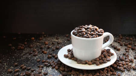Cup With Coffee Beans Isolated on Black Background.の写真素材
