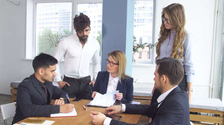 Conclusion of the transaction and signing of the cooperation agreement. Successful business man at a...