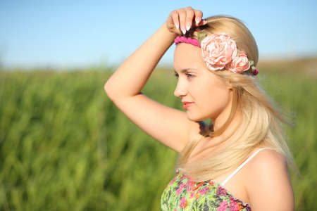 portrait of a cute girl on a background of natureの写真素材