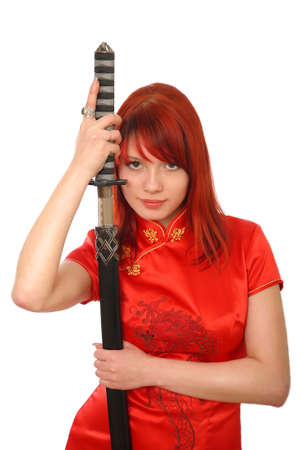 woman with samurai sword on white backgroundの写真素材