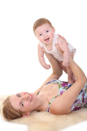 happy mother holding her babyの写真素材