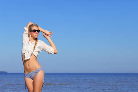 Girl in bikini in the sea waterの写真素材