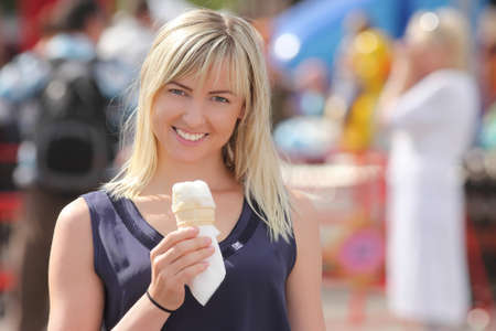 Girl with ice cream on the street