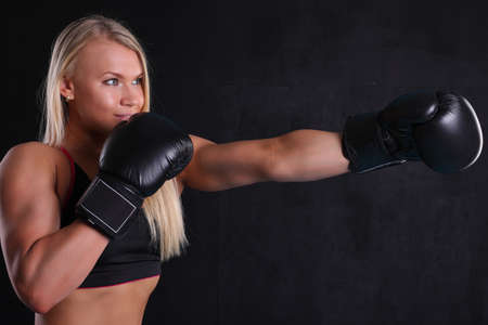 Young pretty boxer womanの写真素材