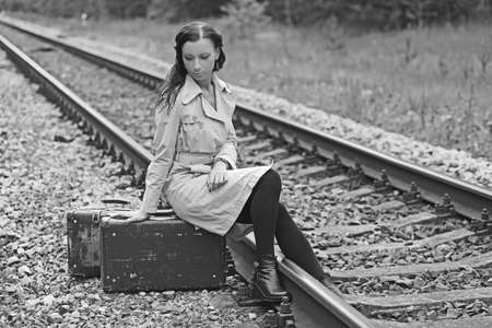refugee woman on the railroadの写真素材