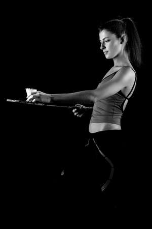 woman with badminton racket . Black and white photoの写真素材