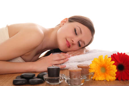 Beautiful woman in spa center on white backgroundの写真素材