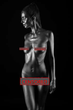 naked female body in a silver body painting. Censored versionの写真素材