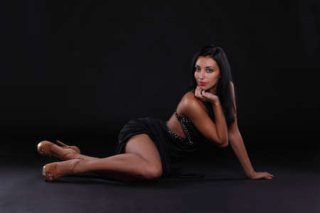 sexy girl in a black dressの写真素材