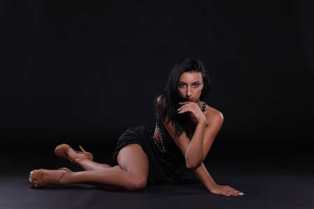 sexy girl in a black dressの写真素材