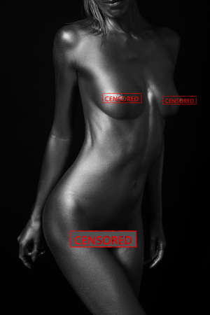 naked female body in a silver body painting. Censored versionの写真素材