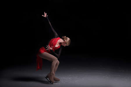 figure skating girl dancing and ice skatingの写真素材
