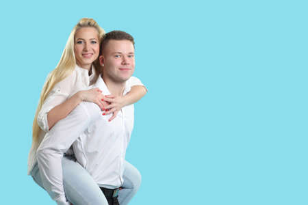 Young beautiful couple in love posing togetherの写真素材