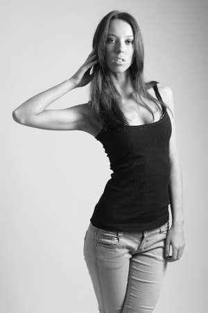 Beauty young fashionable girl posing in clothesの写真素材