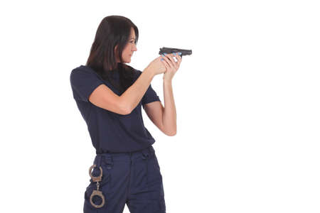 young police woman with gun on white backgroundの写真素材