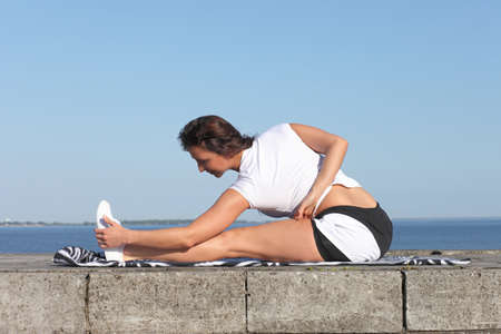 young healthy girl practicing yoga exercises