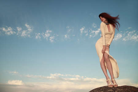 Sexy young beauty woman in white dressの写真素材