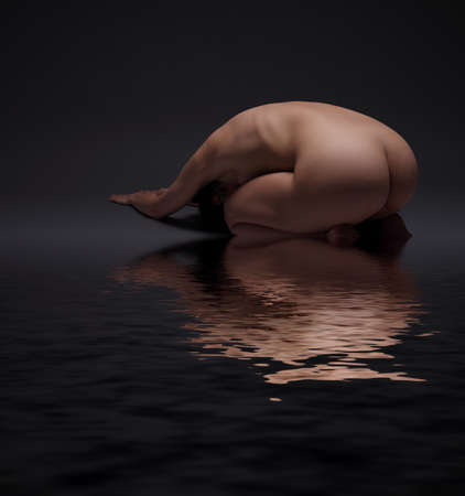 young sport naked girl on a dark backgroundの写真素材