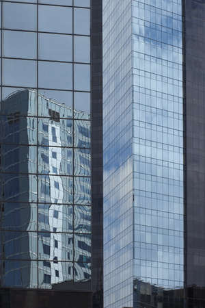 photo of high rise buildings of glass and metal