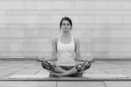 Beautiful young woman doing exercise, Healthy life conceptの写真素材