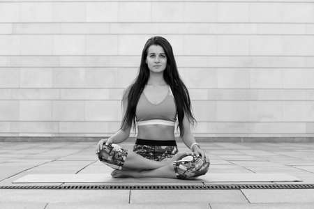 Beautiful young woman doing exercise, Healthy life conceptの写真素材
