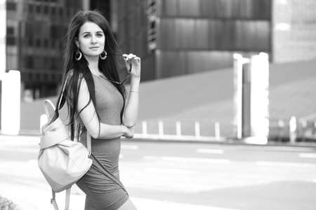 sexy young fashionable girl in the cityscapeの写真素材