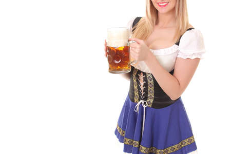 young girl with a mug of fresh light beerの写真素材