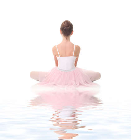 young beauty girl ballerina posing on white backgroundの写真素材