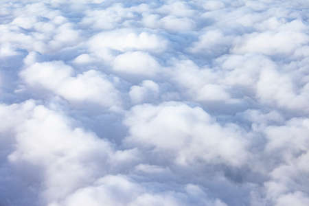 landscape above white clouds in the skyの写真素材
