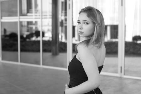 Young beautiful fashionable girl with a cute face