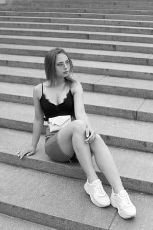 Young beautiful fashionable girl with a cute faceの写真素材