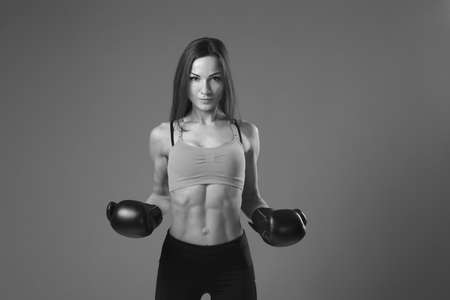 Young pretty boxer woman black and white photoの写真素材