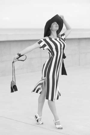 young woman in a long summer dress outdoor walkの写真素材