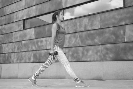 Fitness sexy slim young girl doing exercises