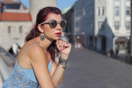 young woman tourist in europe in the city of Tallinnの写真素材