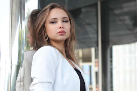 Young beautiful fashionable girl with a cute face