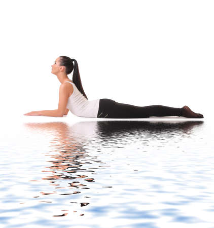 healthy young slim woman practising yoga exercise